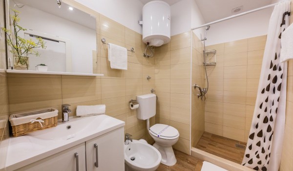 Bathroom of a traditional stone villa Summer Retreat with private parking and wifi