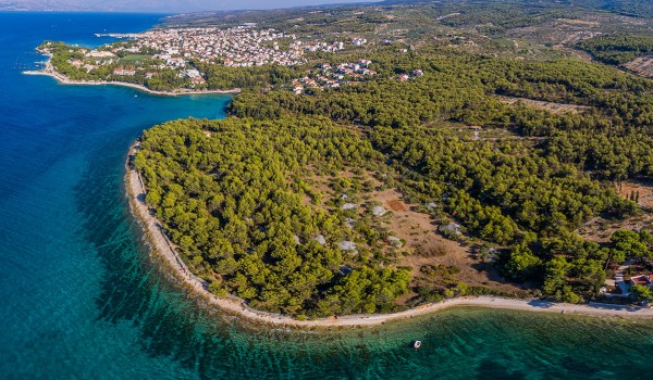 Aerial view of the beautiful bay and traditional stone house for family vacation
