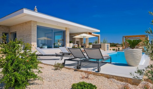 Luxury Croatian villa Summer Dream Privacy Novalja on Pag for rent and holiday by the sea and beach with private heated pool, jacuzzi, sauna and private parking for 7 people