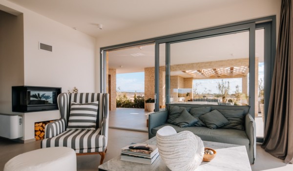Spacious modern interior with access to the terrace with a sea view of the private sea luxury villa for rent Summer Dream Privacy Novalja next to the beach on the island of Pag