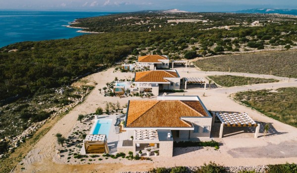 View of the private property of the luxury villa Summer Dream Privacy Novalja with swimming pool, jacuzzi, sauna and private parking for 7 people by the sea and the beach on the island of Pag