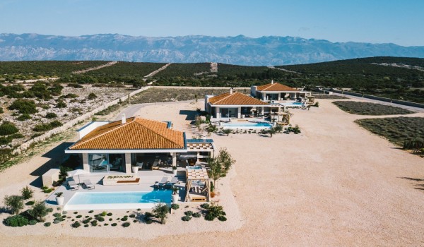 Luxury Croatian villa Summer Dream Privacy Novalja on Pag for rent and holiday by the sea and beach with private heated pool, jacuzzi, sauna and private parking for 7 people
