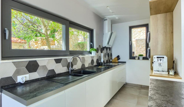 Fully equipped kitchen on the ground floor of the Croatian luxury villa for vacation and rental White Diamond
