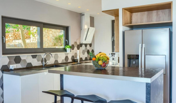 Fully equipped kitchen on the ground floor of the Croatian luxury villa for vacation and rental White Diamond