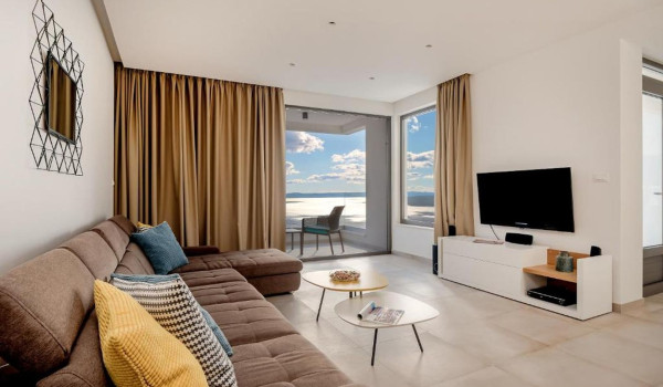 A spacious comfortable living room of the Croatia luxury villa White Diamond with a view of the beautiful islands