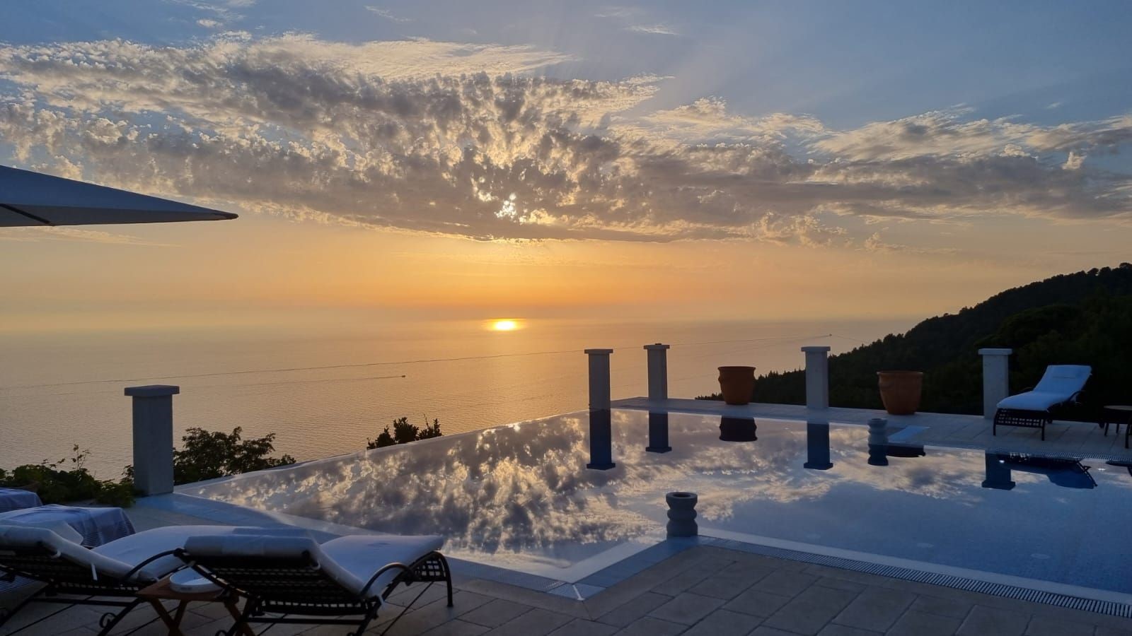 Sunset picture from sunbathing area of Croatia luxury holiday villa Ferarra in Dubrovnik for vacation and rent
