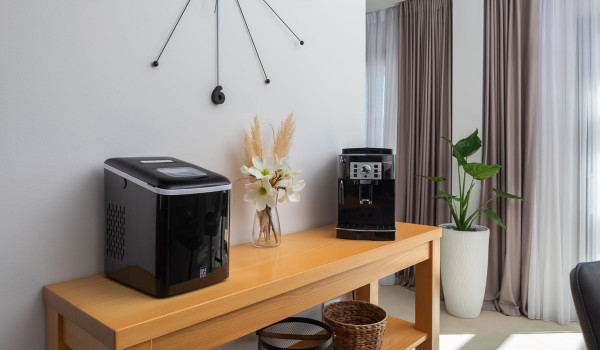 Coffee machine and ice maker in the kitchen of the contemporary newly built villa Indigo with private pool