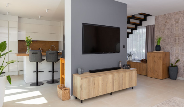 Contemporary kitchen with a kitchen island and a living room with SAT TV on the ground floor of the Dalmatia rental home with private pool