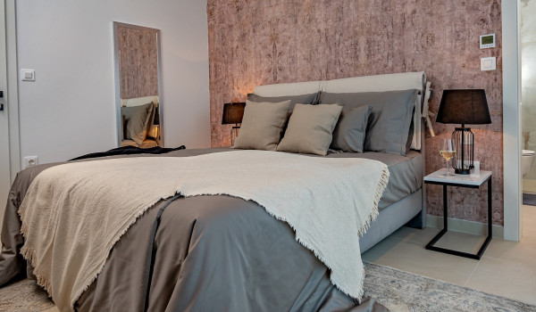 King size bed in the luxury bedroom of the modern newly built villa Indigo in Razanj near Rogoznica