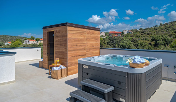 Jacuzzi next to the private sauna on the roof-terrace of the contemporary Croatia rental villa with pool Indigo