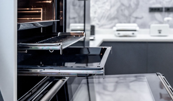 The interior of the oven in the modernly equipped kitchen inside Croatian luxury holiday villa