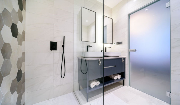 Contemporary interior of en suite bathroom with walk in shower inside Croatian luxury holiday villa