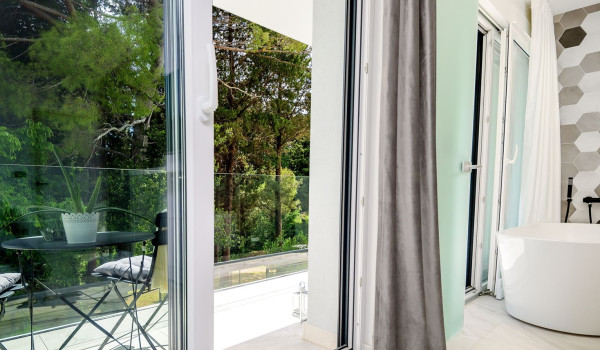 Private exit from the bedroom to the balcony with a seating area inside Croatian luxury holiday villa