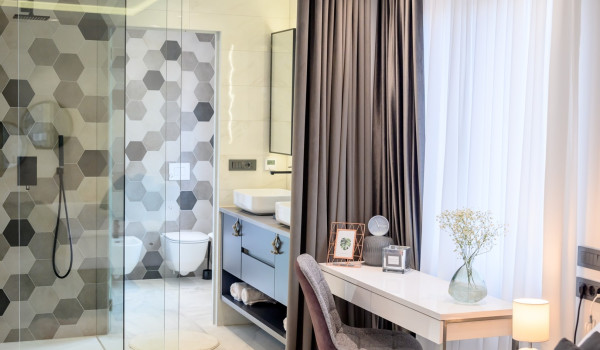 Entrance to the modern en suite bathroom with walk in shower inside Croatian luxury holiday villa