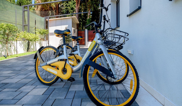Bicycles in the backyard behind the modern family villa in the hinterland of Split