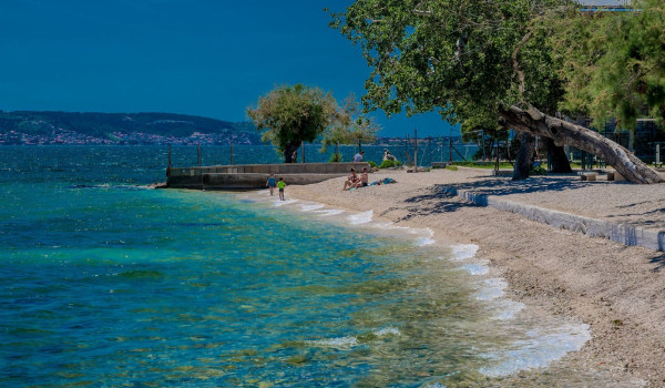 Pebble beach near the luxury villa for rent and holiday near Split