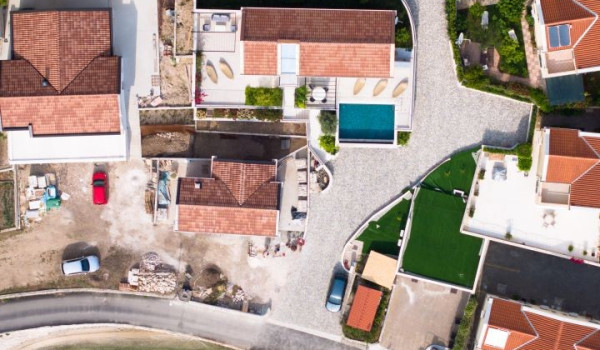 Aerial view of the quiet coastal town of Slano and the property of two luxury villas Sea Child 1 and 2