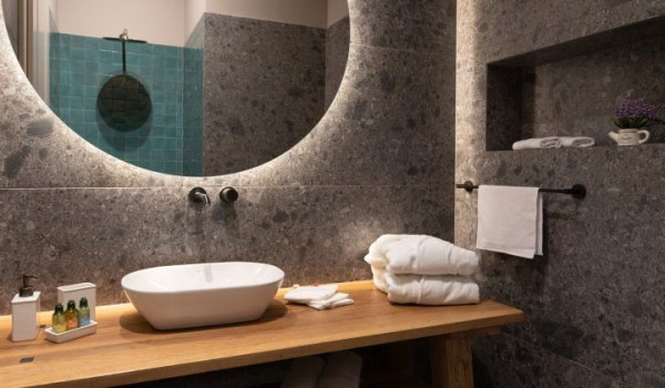 A view of a modern en-suite bathroom with a walk-in shower in a luxury holiday home