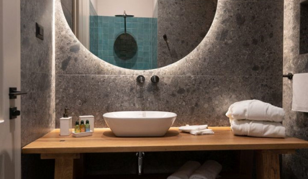 A view of a modern en-suite bathroom with a walk-in shower in a luxury holiday home