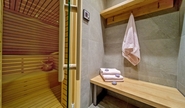 Towels in the private sauna of the modern villa for vacation in Marina