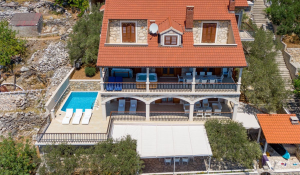 Aerial view of luxury beachfront Croatian villa Korcula Magnificent with private heated pool, jacuzzi and sauna
