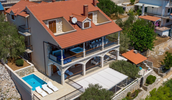 Aerial view of luxury beachfront Croatian villa Korcula Magnificent with private heated pool, jacuzzi and sauna