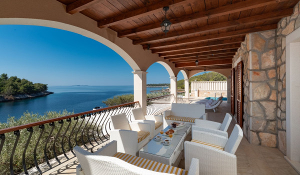 Seating area perfect for breakfast with sea view on the terrace of the luxury family villa on Korcula island with concierge service
