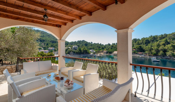 Seating area perfect for breakfast with sea view on the terrace of the luxury family villa on Korcula island with concierge service