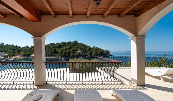 Sun loungers by the pool of the luxury vacation villa Korcula Magnificent with concierge service