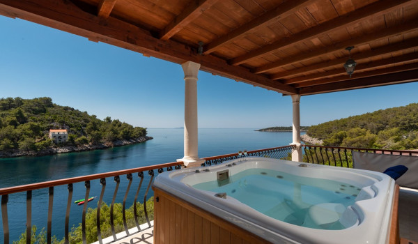 Private jacuzzi on the balcony of the luxury holiday villa on Korcula island with concierge service and private parking