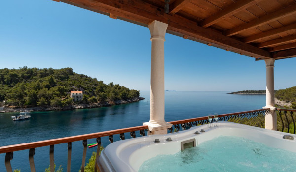 Private jacuzzi on the balcony of the luxury holiday villa on Korcula island with concierge service and private parking