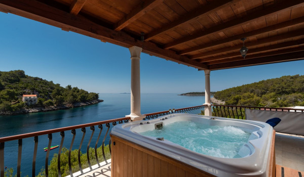 Private jacuzzi on the balcony of the luxury holiday villa on Korcula island with concierge service and private parking