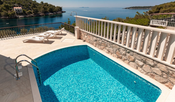 Private heated pool of the luxury beachfront villa Korcula Magnificent with private parking and wi fi