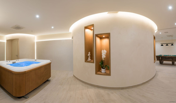 Indoor jacuzzi in a wellness room of the luxury vacation villa with private pool and private parking