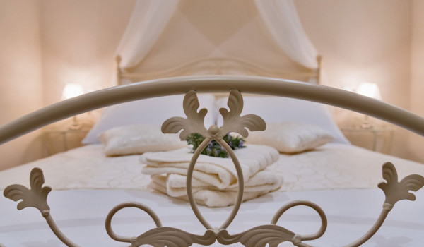 Décor details on a bed in a luxury family villa overlooking the sea on Korcula island