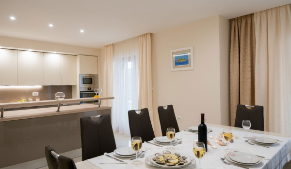Dinner on a dining table in a Korcula luxury beachfront villa with private pool and jacuzzi