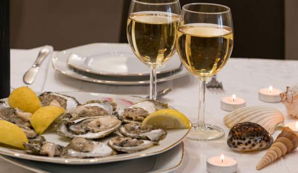 Shellfish dinner in a luxury beachfront villa for family vacation on Korcula island
