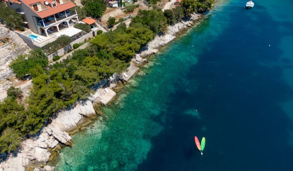 Aerial view of Luxury beachfront villa Korcula Magnificent with private heated pool, jacuzzi and sauna
