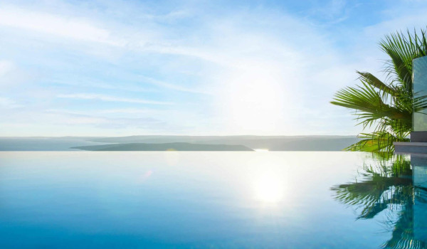 Beautiful crystal clear sea view of Adriatic sea from the heated pool in istrian luxury villa for vacation