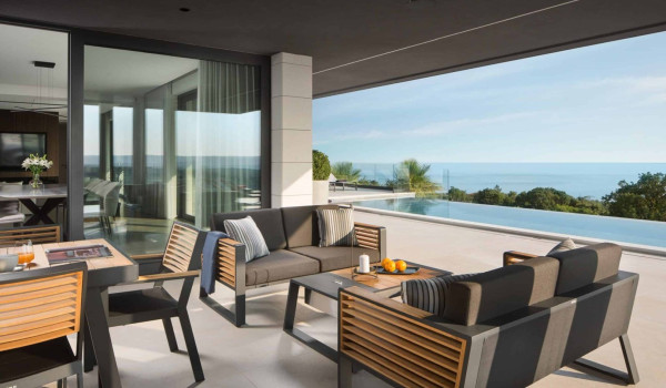 Outdoor dining area by the heated pool in istrian luxury villa Istrian Prestige Panoramica