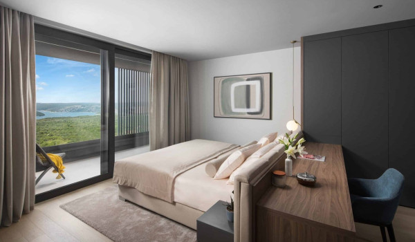 Bedroom with king size bed and en suite bathroom with shower in istrian luxury family villa
