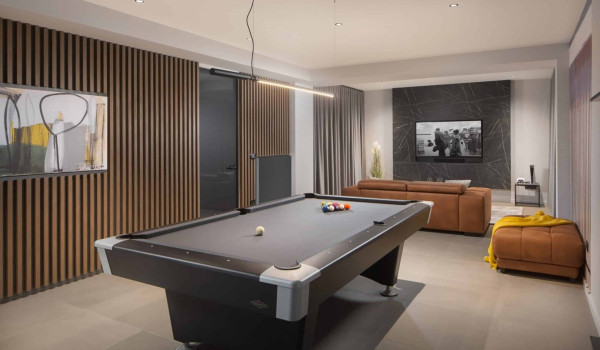 Leisure room with foosball table, PlayStation 5 in Luxury Villa Istrian Prestige Panoramica with heated pool, spa zone, fitness and play room in Brovinje - Istria