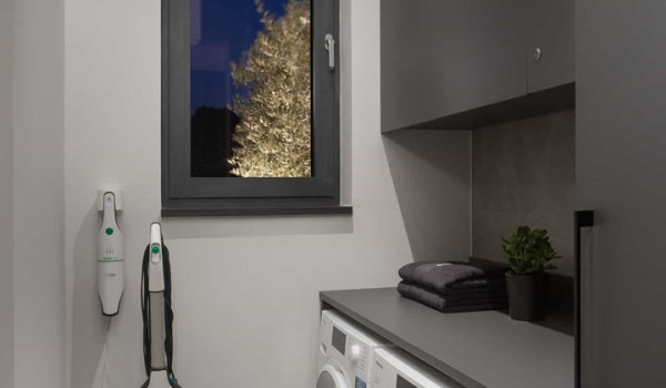 Storage room with vacuum cleaner, washing machine and dryer in istrian luxury villa for vacation