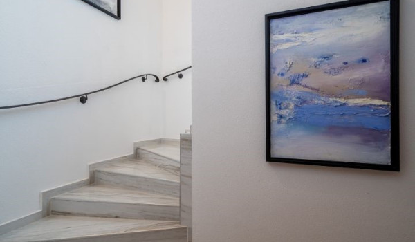 The internal staircase that connects the ground floor and the first floor of this Istrian luxury villa for rent and vacation