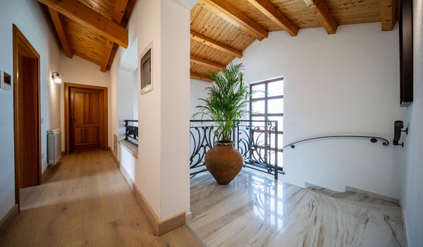 The internal staircase that connects the ground floor and the first floor of this Istrian luxury villa for rent and vacation