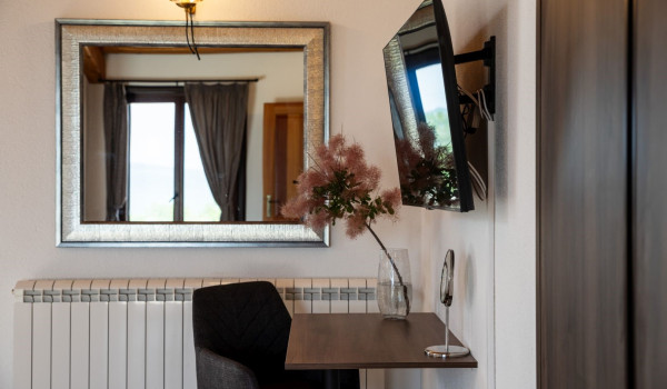 Luxurious, spacious bedroom with king-size bed and en-suite bathroom with walk-in shower