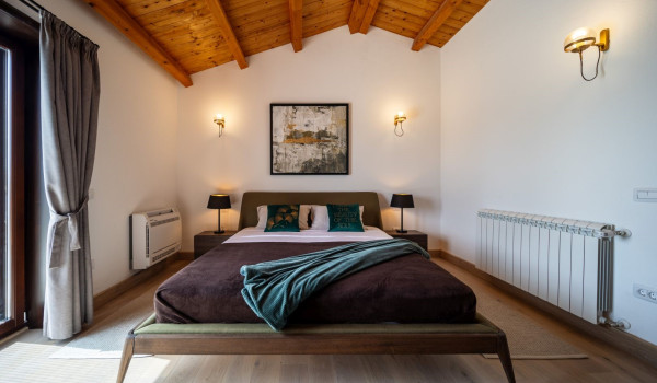 Luxurious, spacious bedroom with king-size bed and en-suite bathroom with walk-in shower