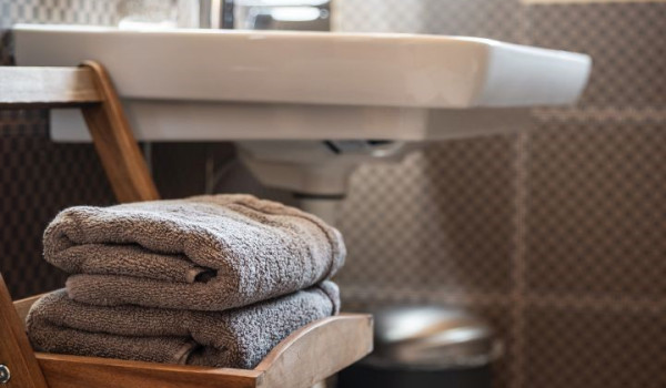 Luxurious, spacious bedroom with king-size bed and en-suite bathroom with walk-in shower