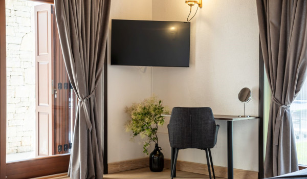 Luxurious, spacious bedroom with king-size bed and en-suite bathroom with walk-in shower