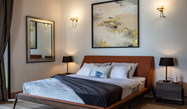 Luxurious, spacious bedroom with king-size bed and en-suite bathroom with walk-in shower